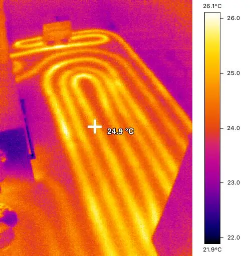 Thermal camera image of heating pipework under a floor