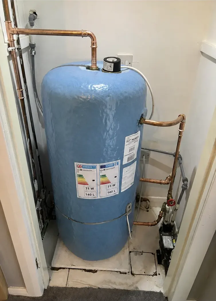 Vented hot-water cylinder and pipework installed by HOLMHEAT